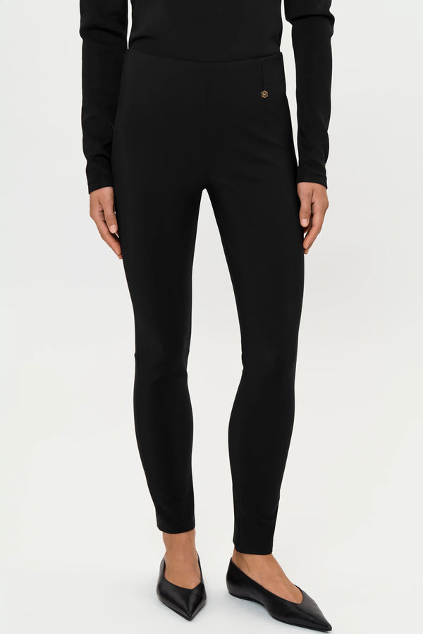 Women's FINA black stretch pants featuring a high-rise waistband and slim stretch fit
